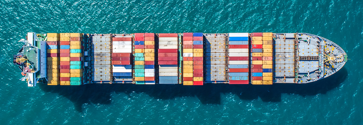 Aerial view of container ship at sea.