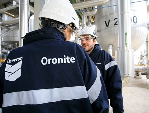 two workers at manufacturing plant and technology center in Gonfreville-l’Orcher